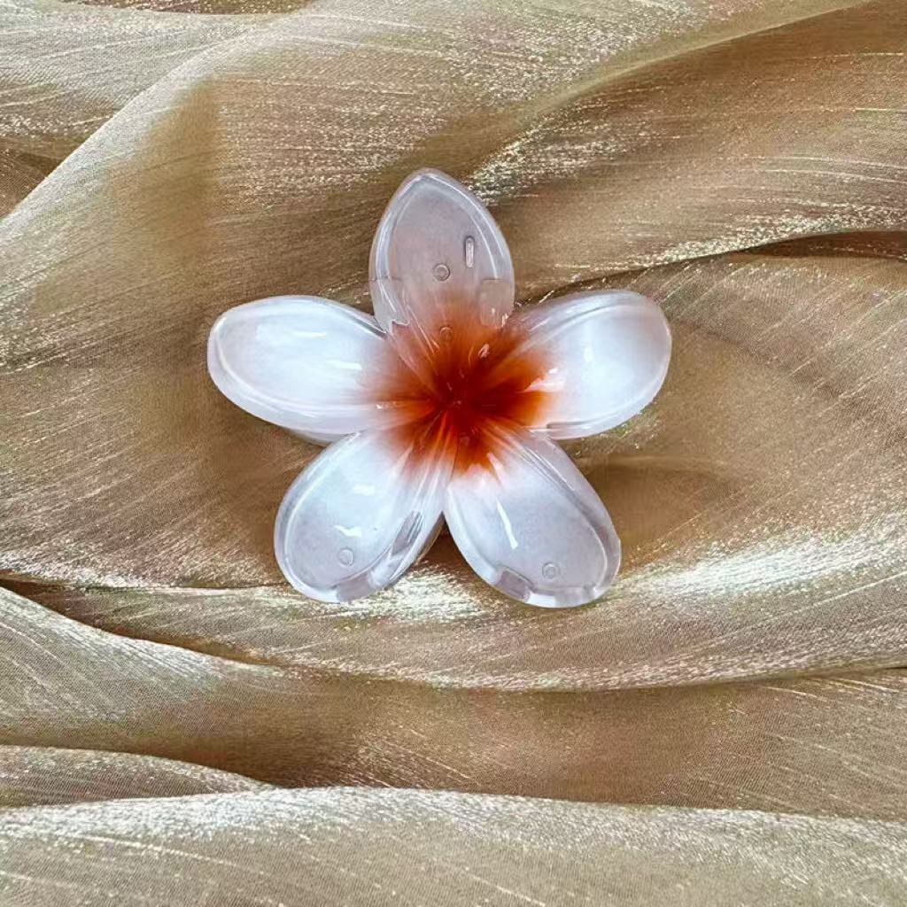 Fashionable Pearlescent Plumeria Hair Claw